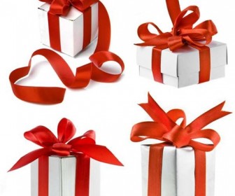 White Gift Boxes with Red Ribbon Over White Background